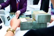 Trong 2 năm, các ngân hàng đã xử lý được 236,8 nghìn tỷ đồng nợ xấu. Ảnh: Lê Tiên