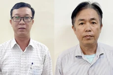 Bị can Phạm Tấn Kiên (trái) và Phạm Văn Vinh