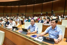 Quốc hội thảo luận ở hội trường về một số nội dung còn ý kiến khác nhau của dự thảo Luật Công đoàn (sửa đổi)