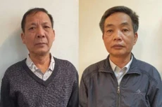 Bị can Đặng Ngọc Cầm (bên trái); Bị can Nguyễn Quốc Khánh (bên phải).