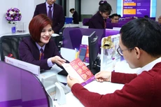 Minh bạch thông tin các ngân hàng thương mại là một phần quy định cần tuân thủ để đáp ứng tiêu chuẩn của Hiệp ước Basel II. Ảnh: Lê Tiên