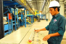 Chính phủ yêu cầu đẩy nhanh tiến độ thực hiện cơ cấu lại doanh nghiệp nhà nước. Ảnh: Lê Tiên