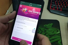 Các công ty công nghệ mạnh tay chi tiền cho các chương trình khuyến mãi để gia tăng người dùng và tranh giành thị phần. Ảnh: Nhã Chi