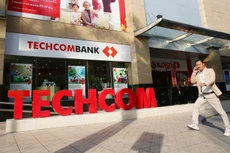 Tính đến ngày 24/9, đã có 11 ngân hàng thương mại đã được Thống đốc NHNN có quyết định áp dụng Thông tư 41 trước thời hạn. Ảnh: Lê Tiên