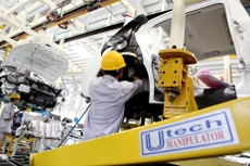 Hiện có sự cách biệt lớn về năng suất giữa DN hàng đầu và nhóm DN có năng suất thấp nhất trong nhóm 500.000 DN Việt Nam. Ảnh: Tường Lâm