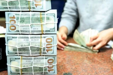 Tác động từ quyết định giảm lãi suất của Cục Dự trữ liên bang Mỹ tới tỷ giá USD/VND được dự báo sẽ không lớn. Ảnh: Lê Tiên