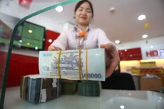 Mặt bằng lãi suất có xu hướng nhích lên trong năm 2018, rõ nét nhất ở lãi suất huy động. Ảnh: Tâm An