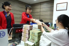 Nhiều ngân hàng thương mại đang huy động tiền gửi với lãi suất trên 8%