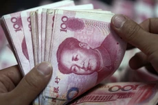 Diễn biến lắt léo của đồng Nhân dân tệ khiến nhiều đồng tiền giảm giá khá mạnh so với USD. Ảnh: Reuters