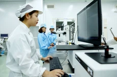 Trong cuộc chơi hội nhập, doanh nghiệp Việt phải tự thay đổi, nâng cao năng lực cạnh tranh thông qua đổi mới quản trị, công nghệ… Ảnh: Lê Tiên