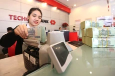 Các ngân hàng đã chủ động và tích cực tìm cách tăng vốn, song không phải dễ thực hiện. Ảnh: Tâm Anh