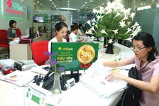 Đến cuối năm 2018, dư nợ tín dụng cho khu vực doanh nghiệp nhỏ và vừa đạt 1.307.000 tỷ đồng, chiếm 18% tổng dư nợ tín dụng. Ảnh: Lê Tiên
