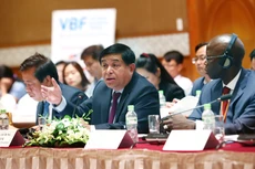 Bộ trưởng Bộ Kế hoạch và Đầu tư Nguyễn Chí Dũng cho rằng, cộng đồng DN Việt Nam bao gồm DN trong nước và DN nước ngoài là động lực quan trọng góp phần đưa nền kinh tế Việt Nam trong thời gian qua liên tục tăng trưởng ở mức cao. Ảnh: Lê Tiên