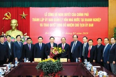 Lễ công bố Nghị quyết của Chính phủ thành lập Ủy ban Quản lý vốn nhà nước tại doanh nghiệp. Ảnh: Quang Hiếu