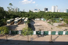 Quá trình cổ phần hoá của nhiều doanh nghiệp bị “treo” do nhiều đơn vị chần chừ xác định lại giá trị quyền sử dụng đất. Ảnh: Tiên Giang