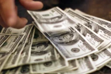 Tỷ giá USD hôm nay 21/6 tiếp tục được điều chỉnh tăng. Ảnh minh họa: Reuters