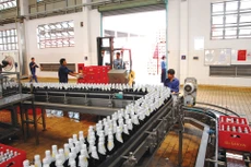 Việc thành lập cơ quan chuyên trách quản lý vốn nhà nước tại doanh nghiệp sẽ góp phần kiến tạo môi trường kinh doanh bình đẳng. Ảnh: Vũ Hướng