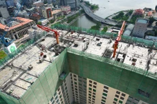 Các điều kiện kinh doanh trong lĩnh vực xây dựng phức tạp gây khó khăn cho chủ đầu tư, nhà thầu. Ảnh: Lê Tiên