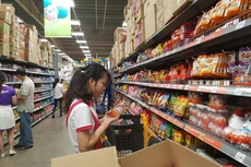 Những quy định mới của Luật Cạnh tranh sẽ khuyến khích, hỗ trợ doanh nghiệp Việt Nam thực hiện các hoạt động mua bán, sáp nhập. Ảnh: Bùi Đức Thâu