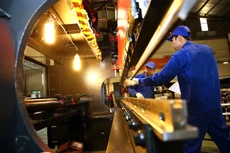 Những cải cách về môi trường đầu tư, kinh doanh đã giúp khu vực doanh nghiệp đóng góp nhiều hơn cho nền kinh tế. Ảnh: Lê Tiên