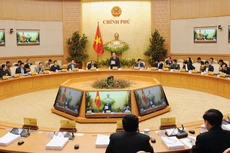 Chính phủ, các bộ, ngành xác định xây dựng thể chế chính sách là ưu tiên hàng đầu để tạo đột phá cho huy động nguồn lực phát triển trong năm 2018. Ảnh: Trần Hải