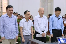 Các bị cáo tại phiên tòa ngày 22/8. Ảnh: Minh Phượng