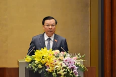 Bộ trưởng Đinh Tiến Dũng thừa ủy quyền báo cáo Quốc hội sáng 22/10