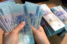 Thay đổi quy định mức giao dịch có giá trị lớn phải báo cáo ngân hàng