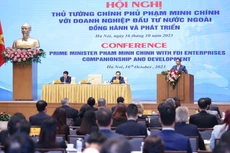 Thủ tướng cam kết Chính phủ luôn bảo vệ quyền và lợi ích hợp pháp, chính đáng của nhà đầu tư trong bất cứ trường hợp nào. Ảnh: VGP