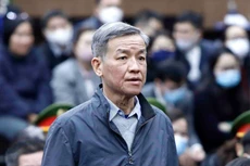 Ông Đinh Quốc Thái tại phiên toà xét xử vụ AIC cuối năm 2022. Ảnh: TTXVN