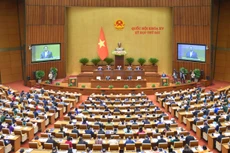 Thủ tướng Chính phủ Phạm Minh Chính trình bày Báo cáo kết quả thực hiện kế hoạch phát triển kinh tế - xã hội năm 2023; dự kiến kế hoạch phát triển kinh tế - xã hội năm 2024. Ảnh: Quốc hội