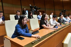 Quốc hội biểu quyết thông qua Luật Nhà ở (sửa đổi)