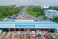Ùn ứ ở cao tốc TP.HCM - Long Thành ngày đầu thu phí không dừng