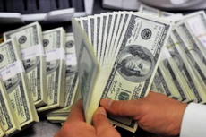 Tỷ giá trung tâm sáng ngày 27/5 ở mức 23.109 VND/USD, tăng 4 đồng so với hôm qua. Ảnh minh họa: TTXVN