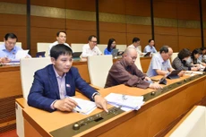 Đại biểu Quốc hội biểu quyết thông qua dự án Luật