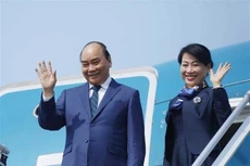 Chủ tịch nước Nguyễn Xuân Phúc và phu nhân. Ảnh: TTXVN