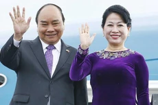 Chủ tịch nước Nguyễn Xuân Phúc và Phu nhân. Ảnh: TTXVN
