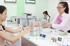 Tín dụng chính thức sẽ chủ động đến với người dân. Ảnh: Tường Lâm