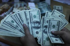 Fed quyết định giữ nguyên lãi suất: Giá USD ổn định. Ảnh: TTXVN

