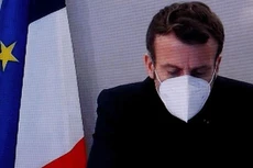 Tổng thống Pháp Emmanuel Macron phát biểu qua video kết nối với một hội nghị về chính sách đối ngoại của Pháp ngày 17/12 - Ảnh: Reuters.