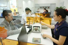 Lợi nhuận của các nhà băng được dự báo khá tích cực trong năm 2020 bất chấp tác động từ dịch Covid-19. Ảnh: Tiên Giang