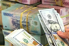 Ngân hàng Nhà nước khẳng định việc điều hành chính sách tiền tệ nhằm ổn định kinh tế vĩ mô, kiểm soát lạm phát. Ảnh: Internet 