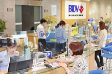 Năm 2021, động lực tăng trưởng của ngành ngân hàng có thể đến từ bảo hiểm, hoặc các phân khúc thị trường, nhóm khách hàng tiềm năng mới. Ảnh: Tường Lâm