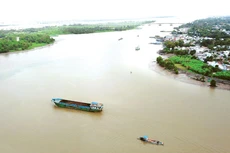 Chính phủ yêu cầu các ngành, các cấp phổ biến, quán triệt quan điểm coi môi trường là điều kiện, nền tảng, yếu tố tiên quyết cho phát triển kinh tế - xã hội bền vững. Ảnh: Lê Tiên