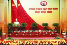 Tổng Bí thư, Chủ tịch nước Nguyễn Phú Trọng trình bày báo cáo của Ban Chấp hành Trung ương Đảng khóa XII về các văn kiện trình Đại hội. Ảnh: Quý Bắc