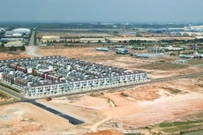 Thị trường bất động sản đã dần được kiểm soát và ổn định hơn nhưng không thể lơ là, chủ quan. Ảnh: Song Lê