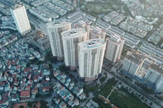 Dòng tiền chảy mạnh vào thị trường chứng khoán và bất động sản là một trong những nội dung cần được phân tích, đánh giá kỹ trong Báo cáo 6 tháng của Chính phủ. Ảnh: Lê Tiên