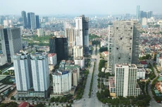 Theo các chuyên gia, nếu những điểm nghẽn pháp lý đối với thị trường bất động sản không được xử lý thoả đáng sẽ ảnh hưởng đến nhiều ngành nghề khác. Ảnh: Lê Tiên