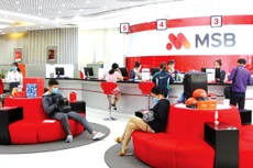 Nhiều ngân hàng công bố lợi nhuận quý I/2021 tăng trưởng vượt trội so với cùng kỳ năm ngoái. Ảnh: Song Lê