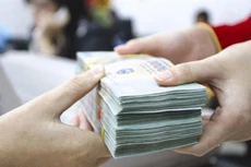 Hàng loạt ngân hàng được tăng “room” tín dụng